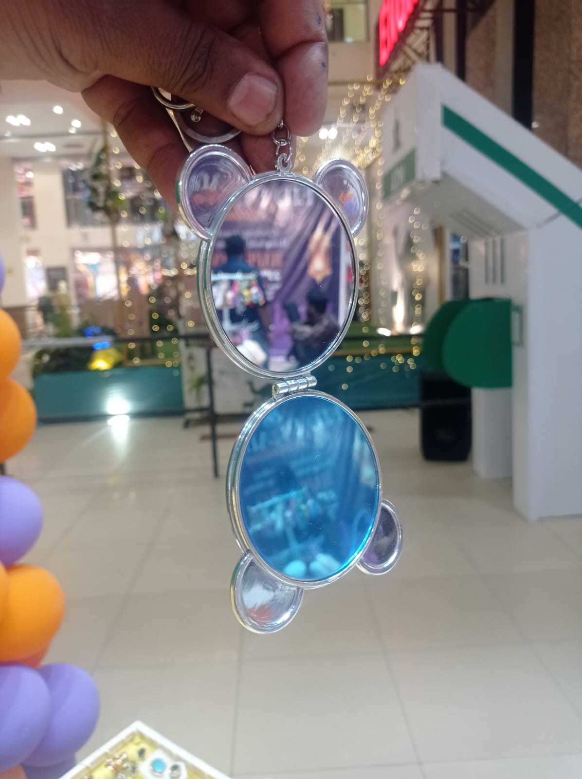 Five bear compact mirror keychains with various printed designs