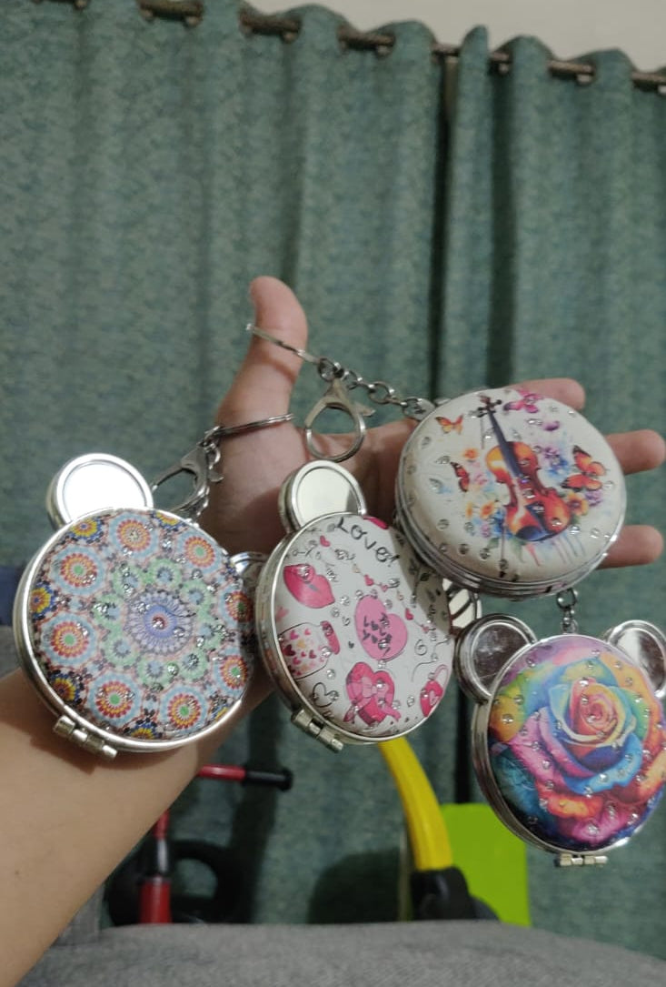 Bear compact mirror keychain open showing blue mirror