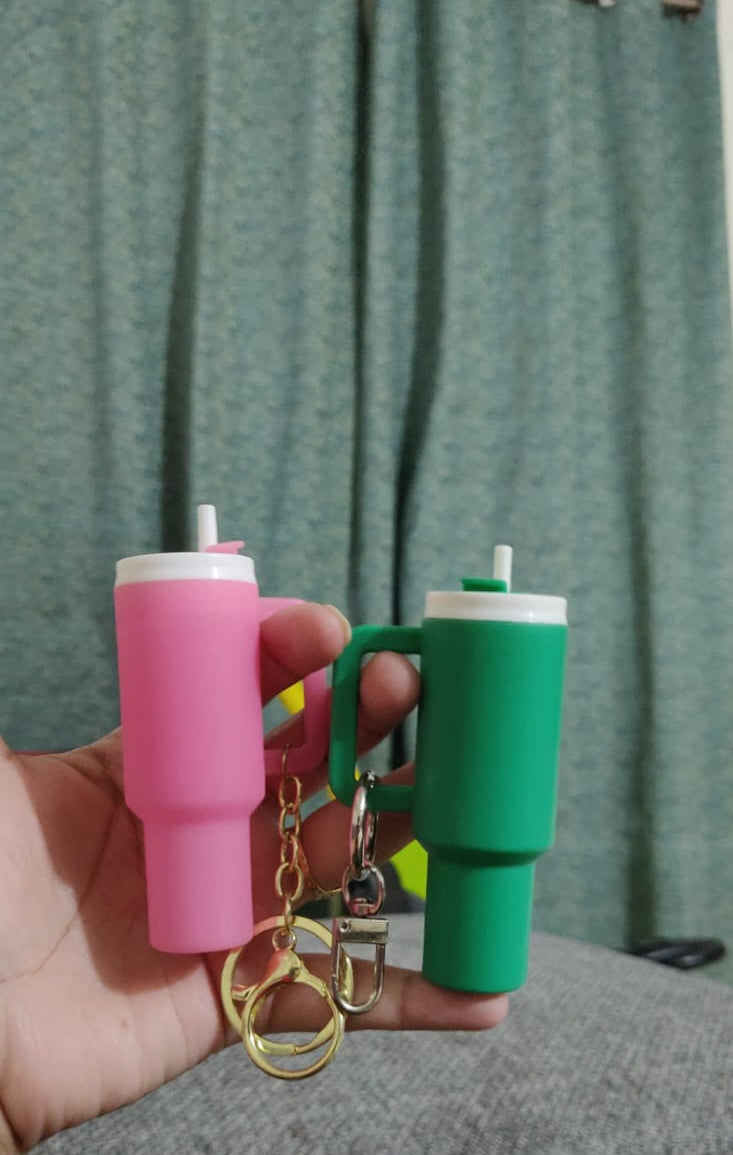Pink and green mini Stanley tumbler keychains side view