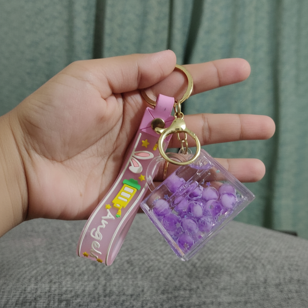 Purple Keychain Hand